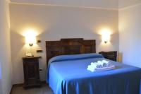 Posteľ alebo postele v izbe v ubytovaní S. Martin Hotel