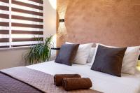 Posteľ alebo postele v izbe v ubytovaní D&A Apartments