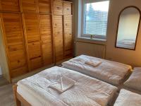 Postel nebo postele na pokoji v ubytování Apartmán Hanka