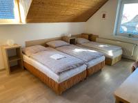 Postel nebo postele na pokoji v ubytování Apartmán Hanka