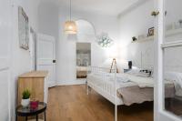 A bed or beds in a room at House of Happy Hours With TERRACE