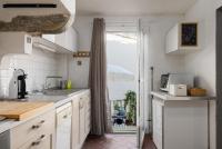 A kitchen or kitchenette at House of Happy Hours With TERRACE