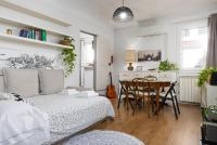 A bed or beds in a room at House of Happy Hours With TERRACE