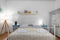 A bed or beds in a room at House of Happy Hours With TERRACE