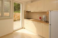 Kuchyň nebo kuchyňský kout v ubytování Apartments Vasilic-Cugalj-Smokvina