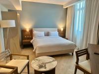 Postel nebo postele na pokoji v ubytování Phoenix Hotel & Wellness