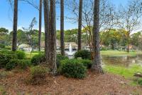 Ein Garten an der Unterkunft Fairways 228 &quot;Bluegrass Bungalow&quot;