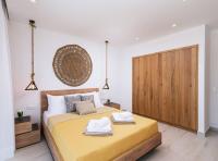 Posteľ alebo postele v izbe v ubytovaní 3 Muses Luxury Villas
