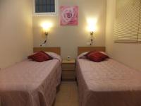 Posteľ alebo postele v izbe v ubytovaní Apartamento Bahia Dorada