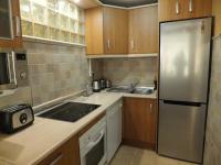 Kuchyňa alebo kuchynka v ubytovaní Apartamento Bahia Dorada