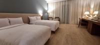 Postel nebo postele na pokoji v ubytování Phoenix Hotel & Wellness
