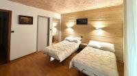 Posteľ alebo postele v izbe v ubytovaní L'AIGLON appartement