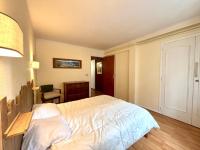 Posteľ alebo postele v izbe v ubytovaní L'AIGLON appartement