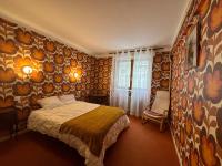 Posteľ alebo postele v izbe v ubytovaní L'AIGLON appartement