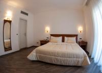 Postel nebo postele na pokoji v ubytování Resort Santangelo & SPA