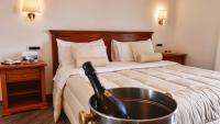Postel nebo postele na pokoji v ubytování Resort Santangelo & SPA