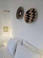 Postel nebo postele na pokoji v ubytování Galazio Rooms & Suites