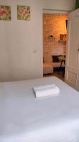 Postel nebo postele na pokoji v ubytování Apartamento en Sevilla Centro con Vistas a la Plaza Alameda de Hércules - Hasta 7 personas