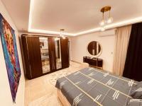 Postel nebo postele na pokoji v ubytování مدينتي شقه مميزه جديده فرش فندقي عالي جدا madinaty luxury apartment