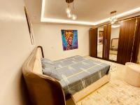 Postel nebo postele na pokoji v ubytování مدينتي شقه مميزه جديده فرش فندقي عالي جدا madinaty luxury apartment
