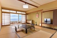 ホテル三楽荘にあるテレビまたはエンターテインメントセンター