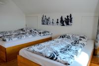 Postel nebo postele na pokoji v ubytování Apartmán Hejč
