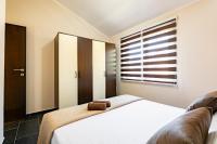 Posteľ alebo postele v izbe v ubytovaní D&A Apartments