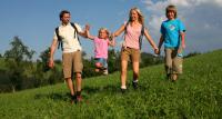 a group of people running in a field at Gasthof Holländer Eck in Lennestadt