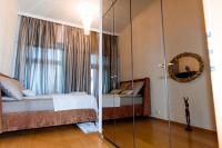 Postel nebo postele na pokoji v ubytování Staropramenna Garden Residence