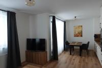 TV a/nebo společenská místnost v ubytování Apartmán Rozárka Černý Důl