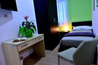 Posteľ alebo postele v izbe v ubytovaní Il triclinio B&B