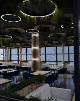 een restaurant met tafels en stoelen en een kroonluchter bij Friday Old City Hotel in Tasjkent