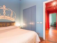 Posteľ alebo postele v izbe v ubytovaní Campo de Fiori Luxury House