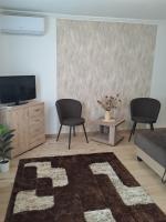 Telewizja i/lub zestaw kina domowego w obiekcie Katarina apartman