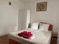 Łóżko lub łóżka w pokoju w obiekcie Holiday Home 1