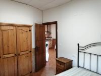 Posteľ alebo postele v izbe v ubytovaní Alojamiento Rural Sierra de Jerez