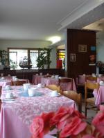Reštaurácia alebo iné gastronomické zariadenie v ubytovaní Hotel Primavera