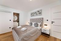 Posteľ alebo postele v izbe v ubytovaní Villa Njivice Apartman Marina