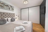 Posteľ alebo postele v izbe v ubytovaní Villa Njivice Apartman Marina
