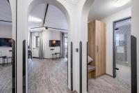 Televízia a/alebo spoločenská miestnosť v ubytovaní Hotel LÜ - Adults Only