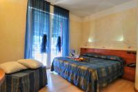 Posteľ alebo postele v izbe v ubytovaní Hotel Savoia