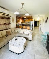 Posezení v ubytování Tilal villa with private garden sea view-4 Room For families only