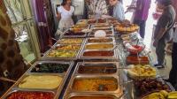 a buffet line with many different types of food at Inn of the Four Sisters in Gonder