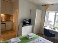 Kuchyňa alebo kuchynka v ubytovaní Apartment Zsa Zsa Zenta 1