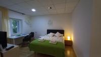 Posteľ alebo postele v izbe v ubytovaní Apartment Zsa Zsa Zenta 1