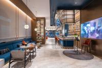 Manxin Hotel Wuhan Hankou Fanhai CBD Xinhua Roadにあるシーティングエリア