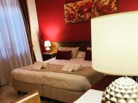 Łóżko lub łóżka w pokoju w obiekcie Hotel Borgo Antico