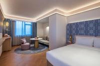 Manxin Hotel Wuhan Hankou Fanhai CBD Xinhua Roadにあるベッド