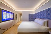 Manxin Hotel Wuhan Hankou Fanhai CBD Xinhua Roadにあるベッド
