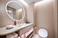 Manxin Hotel Wuhan Hankou Fanhai CBD Xinhua Roadにあるバスルーム